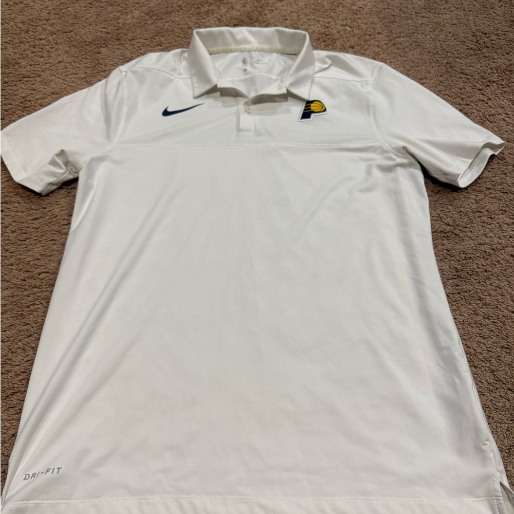 Nike Indiana Pacers Dri-FIT white polo shirt.